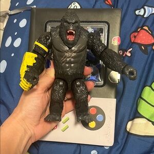 Black and Yellow Action Figure